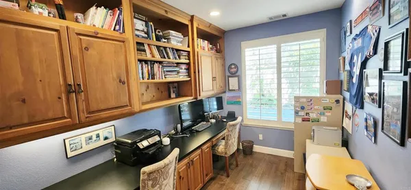 a kitchen with stainless steel appliances granite countertop a stove and a refrigerator