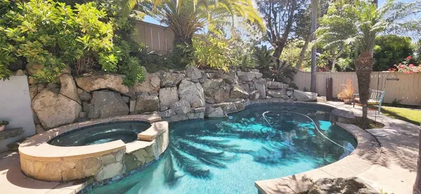 a view of a back yard of the house