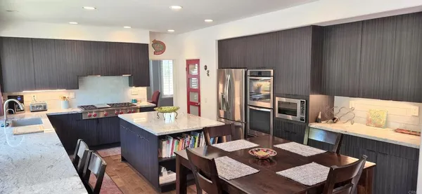 a view of a dining room with furniture