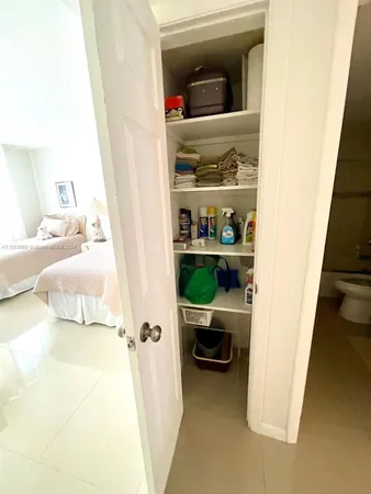 a bed room with a bed and a window