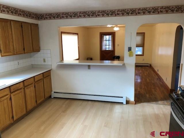 1862 9 Road Mack, CO 81525 - Photo 15 of 26 a kitchen with a sink and a wooden floor