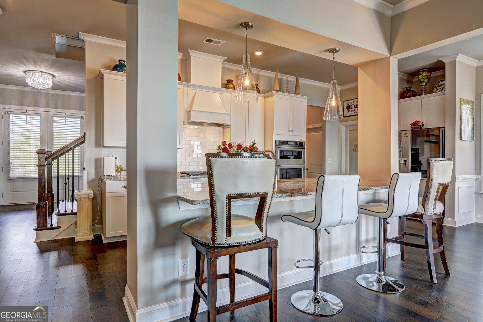 1522 Windward Locust Grove, GA 30248 - Photo 14 of 76 a view of a dining room with furniture and wooden floor
