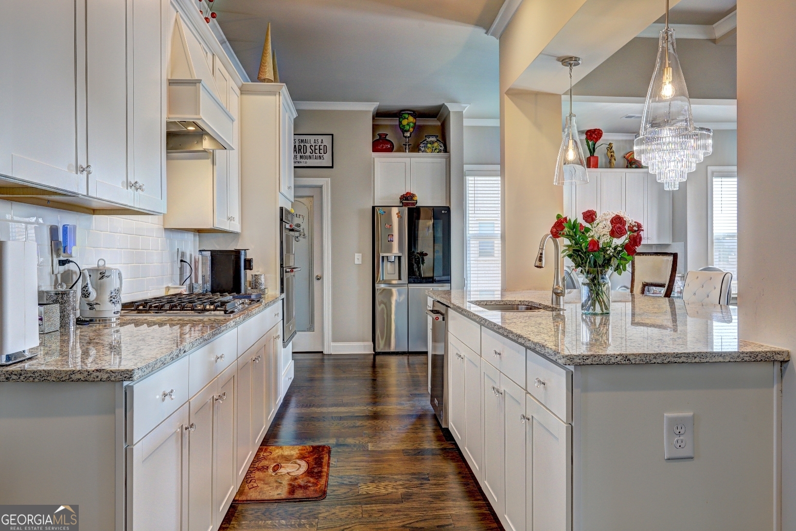 1522 Windward Locust Grove, GA 30248 - Photo 15 of 76 a kitchen with stainless steel appliances granite countertop a lot of counter top space and cabinets