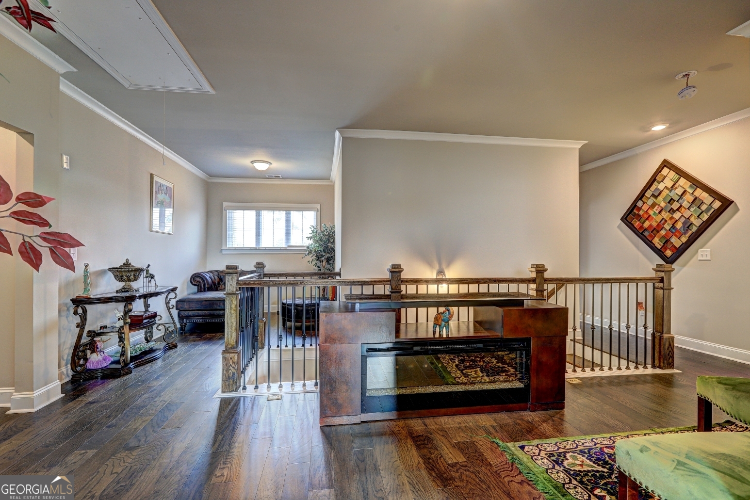 1522 Windward Locust Grove, GA 30248 - Photo 30 of 76 a living room with furniture a wooden floor and a fireplace