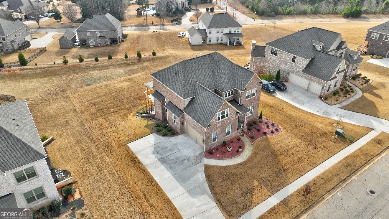 1522 Windward Locust Grove, GA 30248 - Photo 3 of 76 an aerial view of residential houses with outdoor space