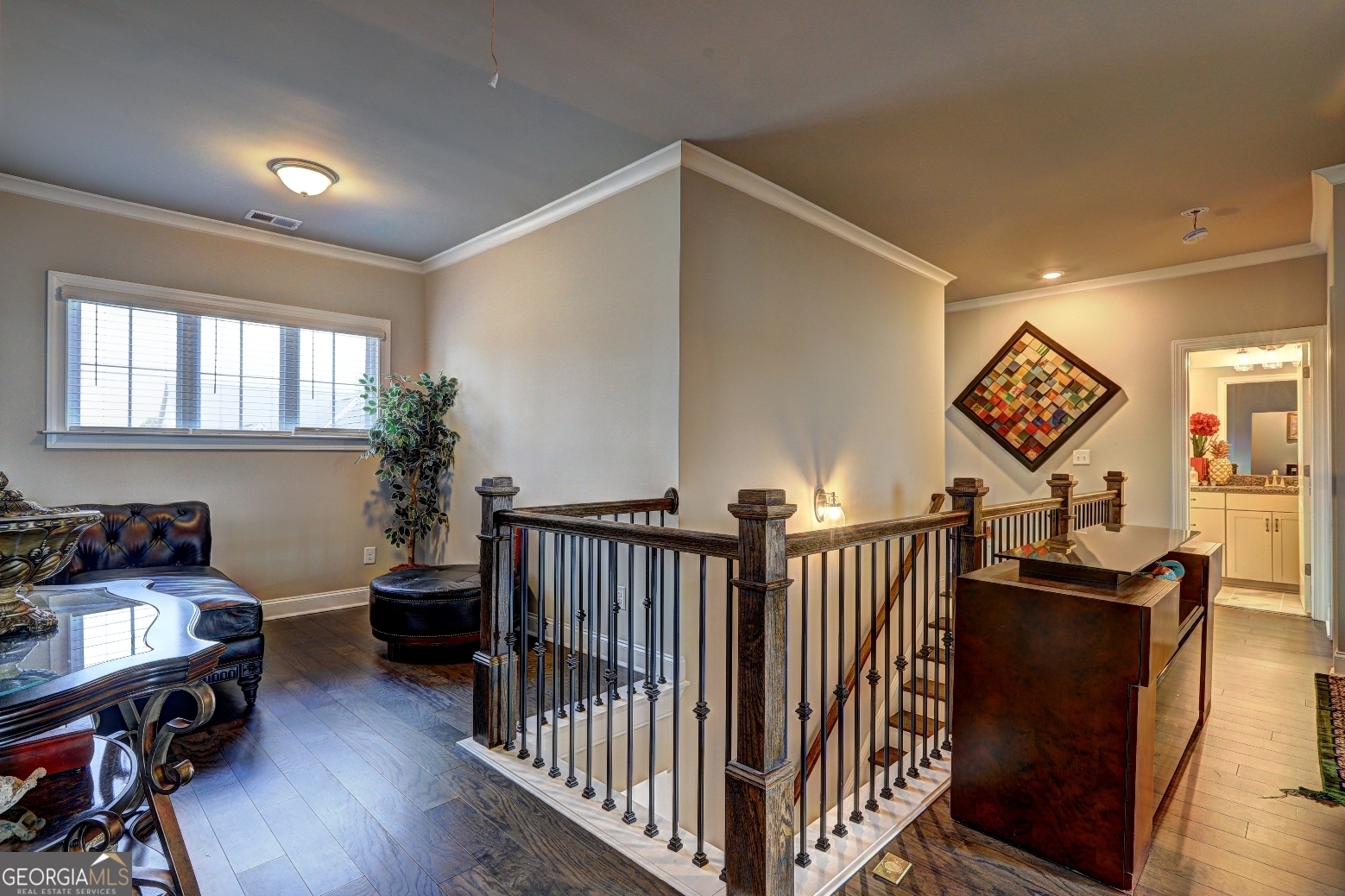 1522 Windward Locust Grove, GA 30248 - Photo 31 of 76 a view of a hallway to room with wooden floor and windows