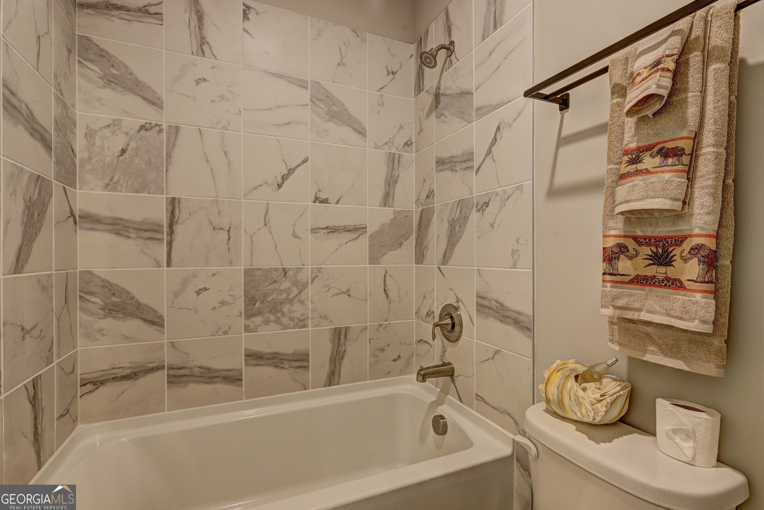 1522 Windward Locust Grove, GA 30248 - Photo 42 of 76 a bathroom with a shower and a bathtub