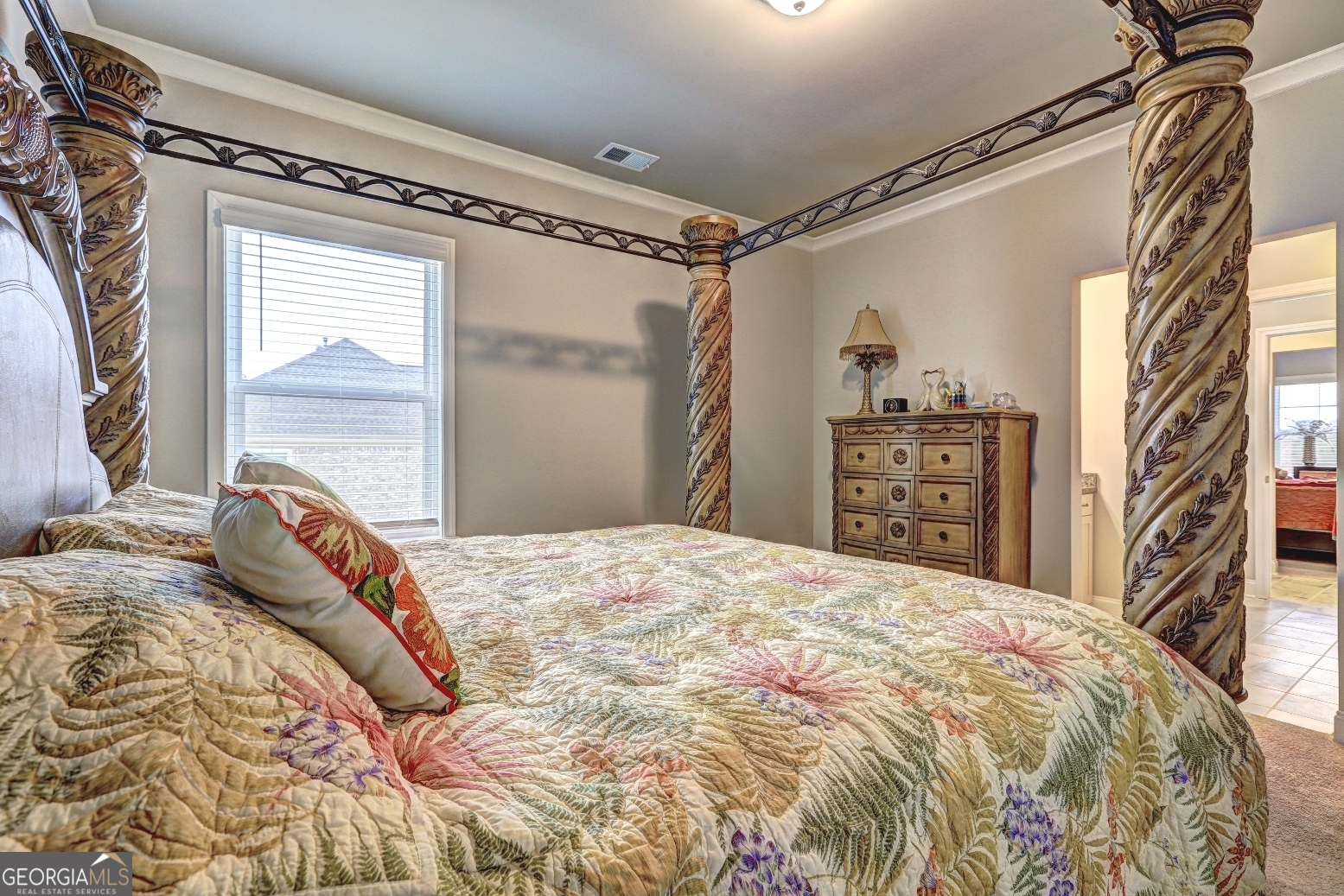 1522 Windward Locust Grove, GA 30248 - Photo 50 of 76 a bedroom with a bed and a dresser