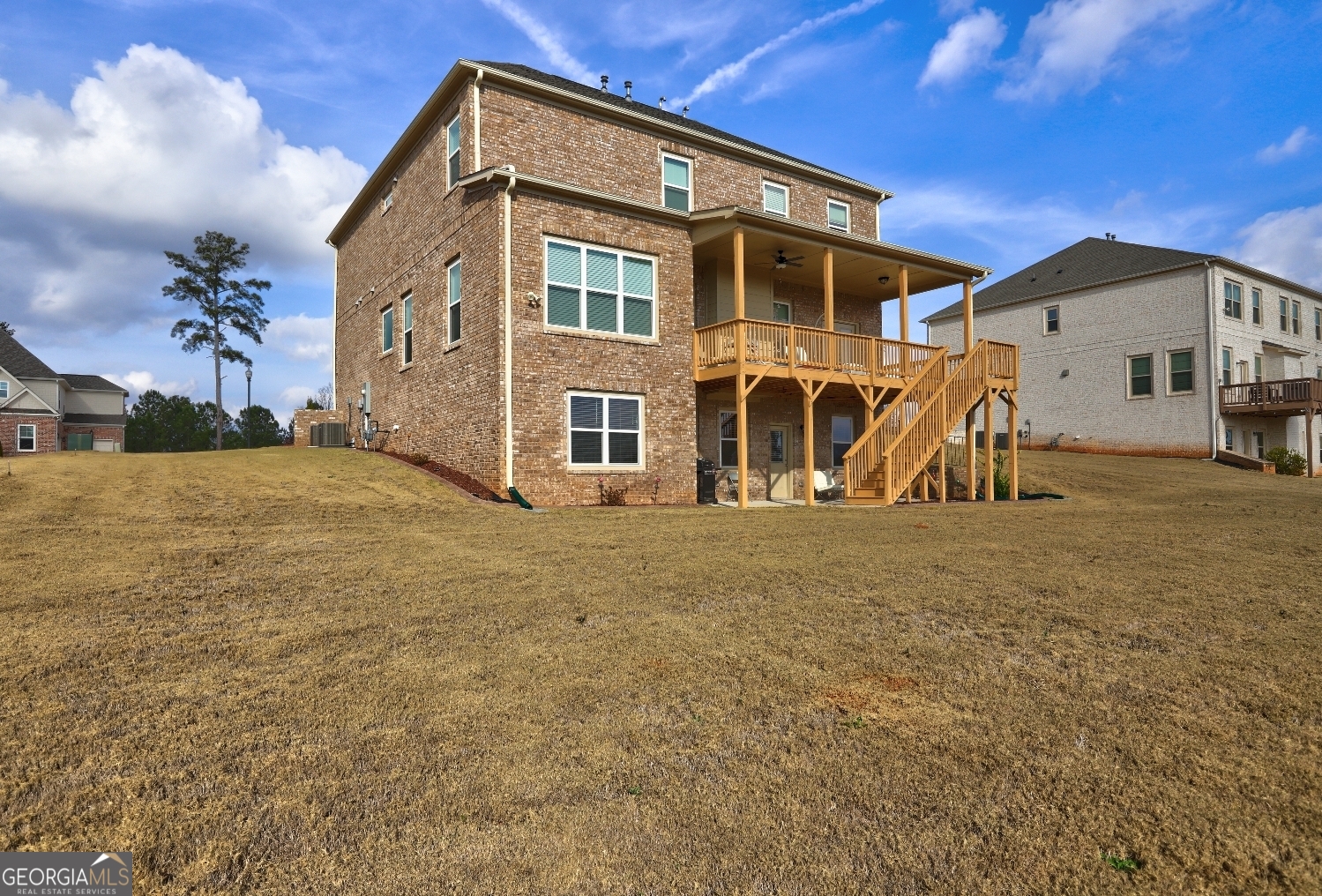 1522 Windward Locust Grove, GA 30248 - Photo 59 of 76 a view of a house with large windows