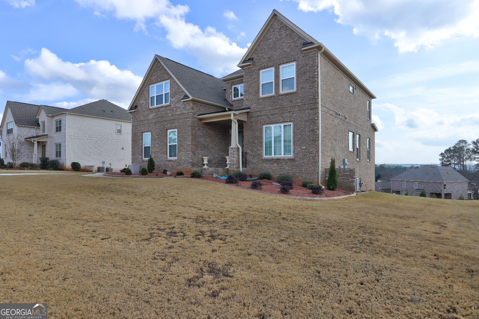 1522 Windward Locust Grove, GA 30248 - Photo 6 of 76 a front view of a house with a yard