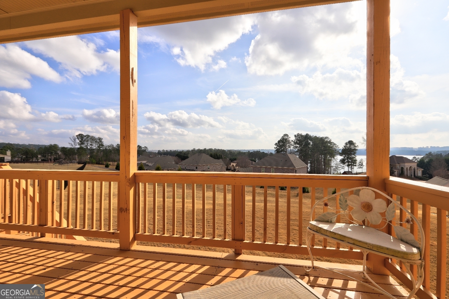 1522 Windward Locust Grove, GA 30248 - Photo 64 of 76 a view of a balcony with wooden floor
