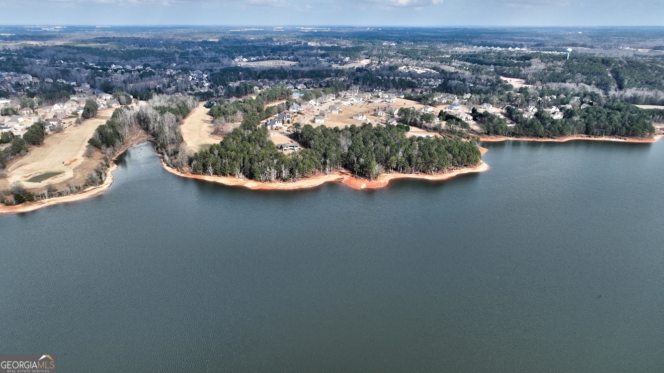 1522 Windward Locust Grove, GA 30248 - Photo 70 of 76 an aerial view of residential house with outdoor space and lake view