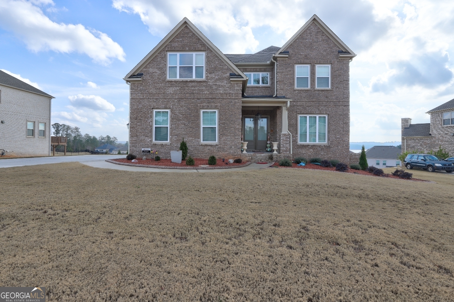 1522 Windward Locust Grove, GA 30248 - Photo 7 of 76 a front view of a house with a yard