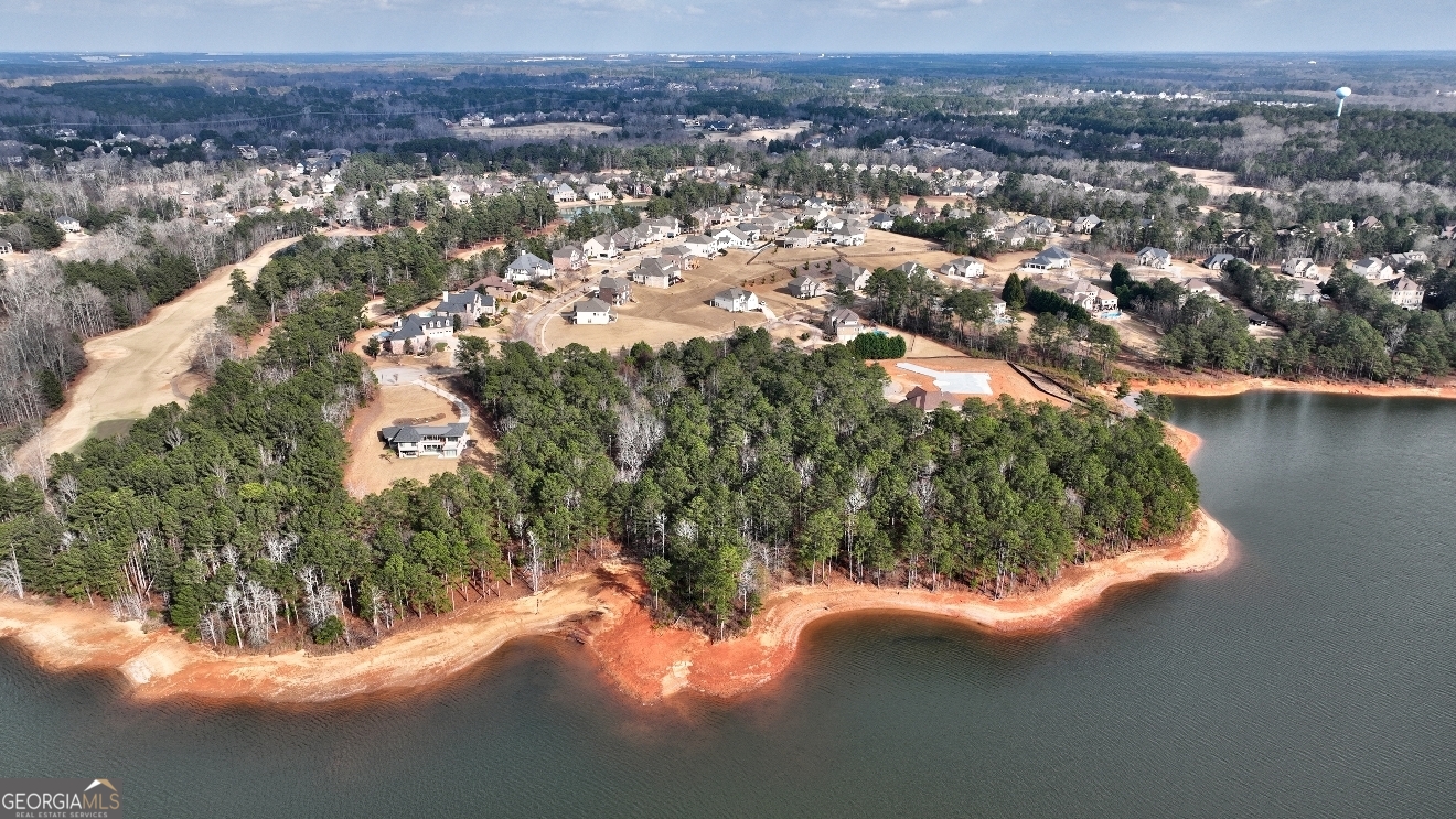 1522 Windward Locust Grove, GA 30248 - Photo 75 of 76 an aerial view of residential houses with outdoor space and river