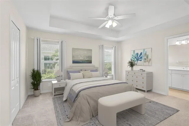 a bathroom with a sink a toilet and a large mirror