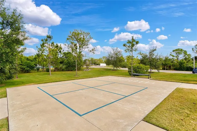 a view of a swimming pool with a patio