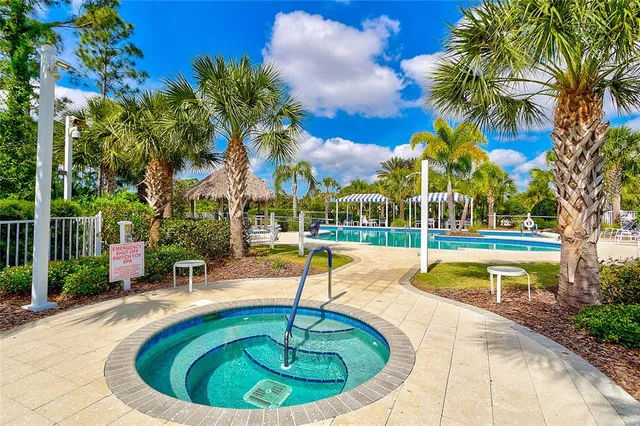 a view of a dining room with furniture and window