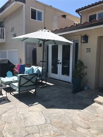 a view of a lounge chairs in the patio