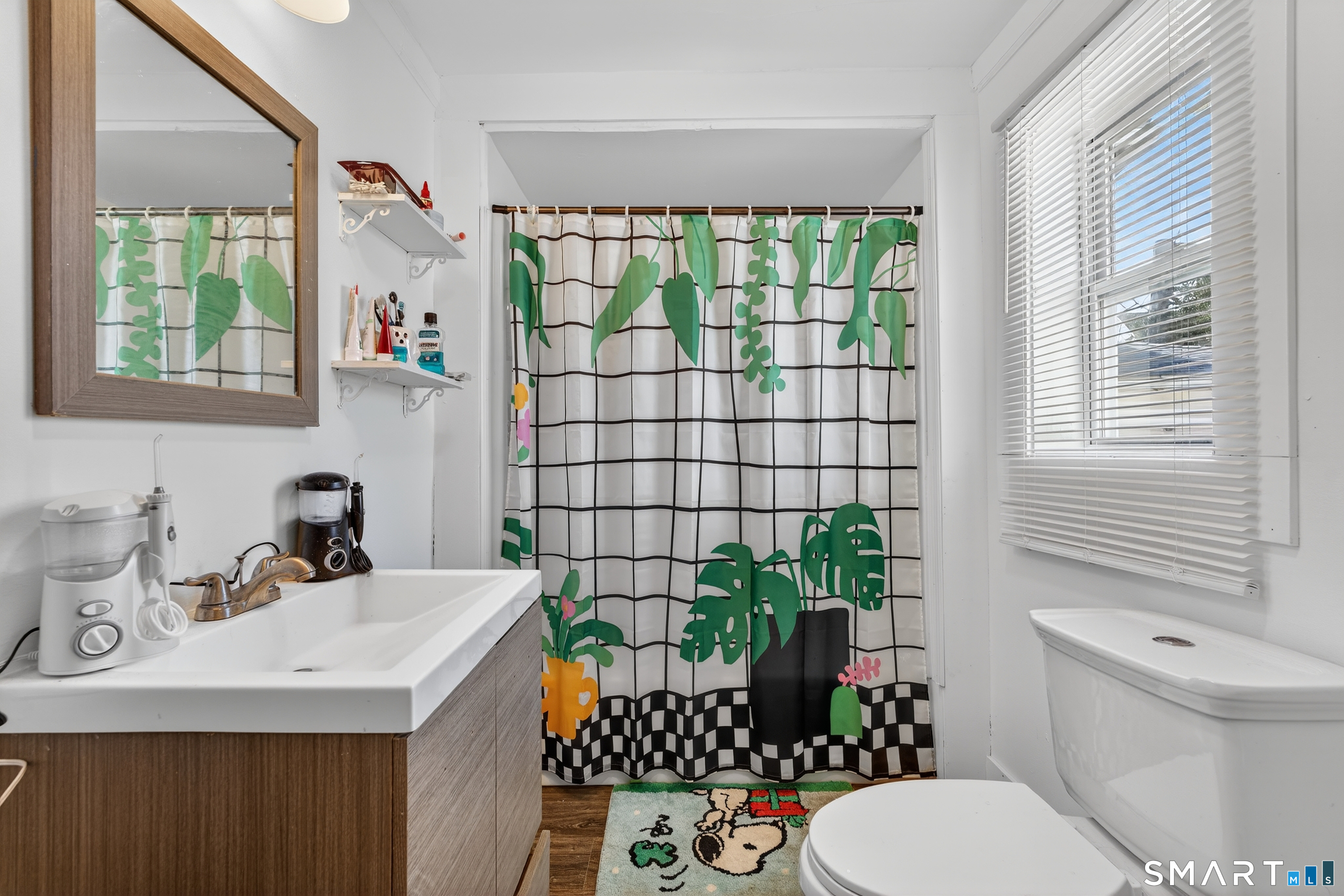 720 Baldwin Street Waterbury, CT 06706 - Photo 26 of 40 a bathroom with a sink toilet and shower