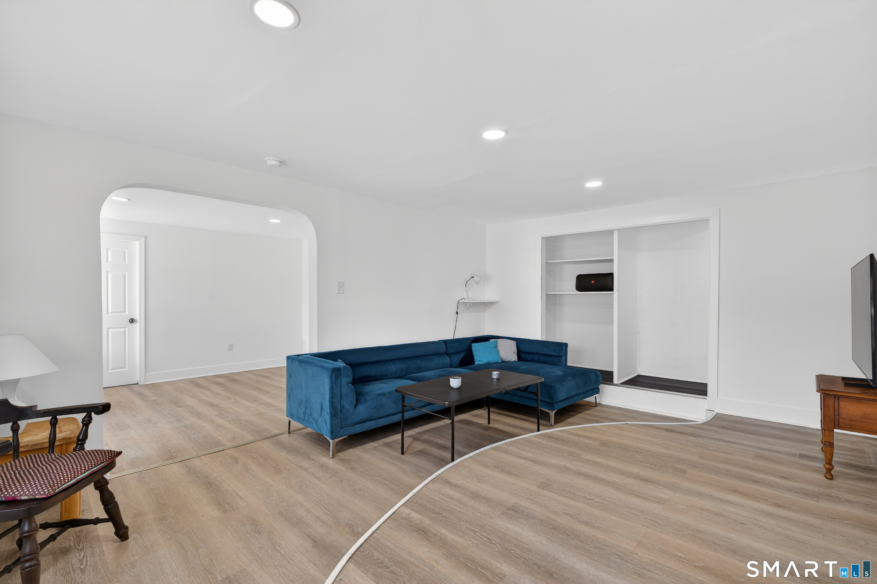 720 Baldwin Street Waterbury, CT 06706 - Photo 32 of 40 a living room with furniture and a wooden floor
