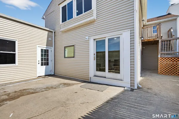 a view of a house with a door and a window