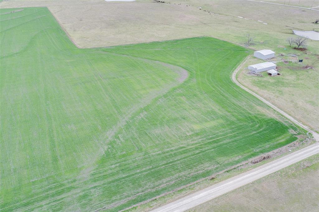 Tbd Baker Road, Unit LOT 2 Pilot Point, TX 76258 - Photo 6 of 6 a view of a golf course with a garden