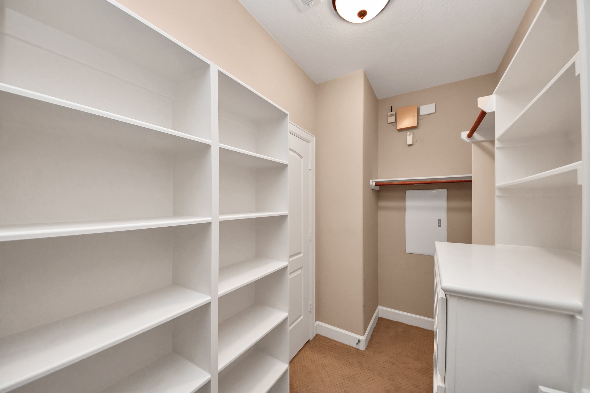 4506 Feagan Street, Unit B Houston, TX 77007 - Photo 26 of 35 a view of an empty room with empty racks