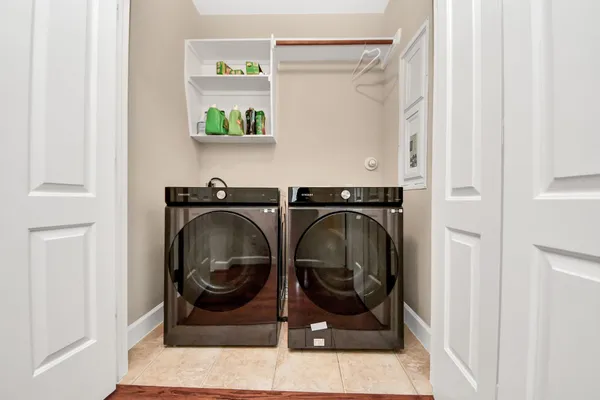 a utility room with dryer and washer
