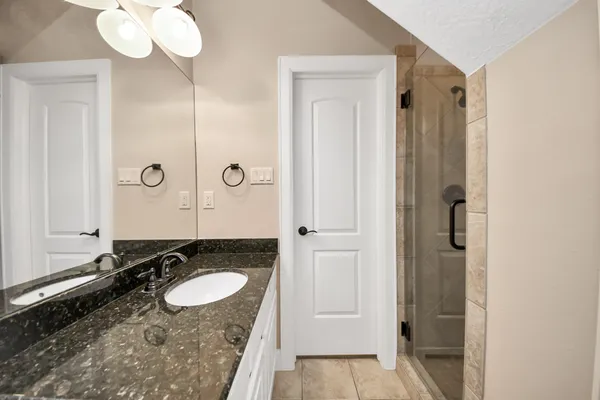 a view of a backyard with pathway