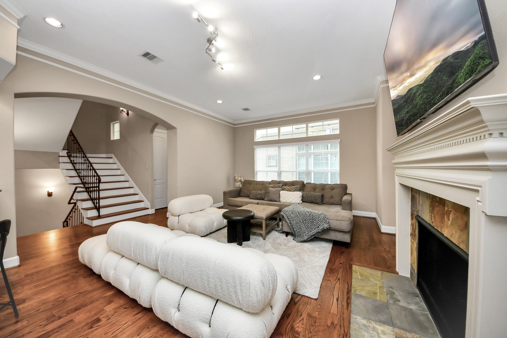 4506 Feagan Street, Unit B Houston, TX 77007 - Photo 35 of 35 a living room with furniture and a fireplace