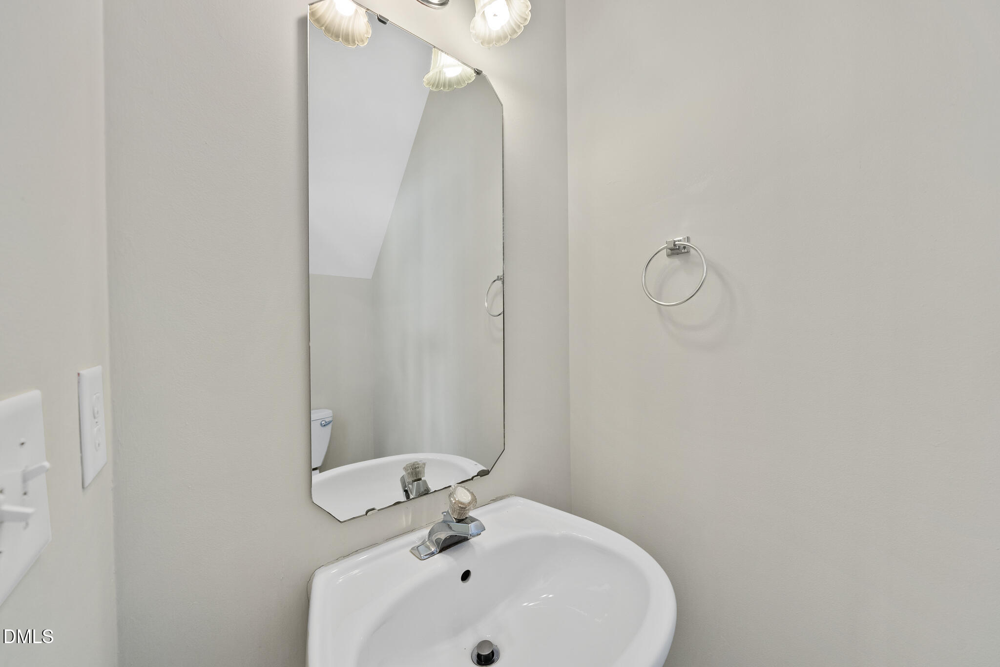 1024 Goldmist Lane Durham, NC 27713 - Photo 11 of 46 a bathroom with a sink and mirror