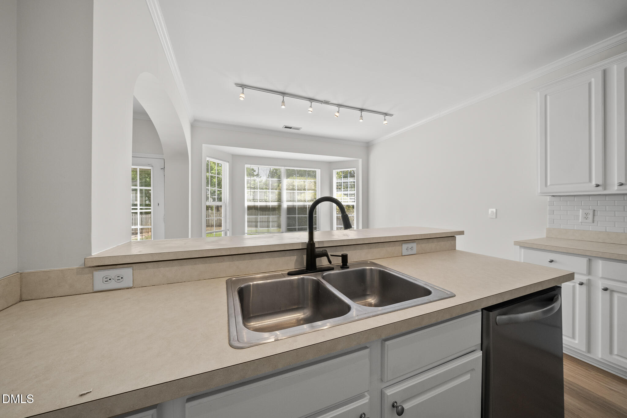 1024 Goldmist Lane Durham, NC 27713 - Photo 13 of 46 a kitchen with a sink and cabinets