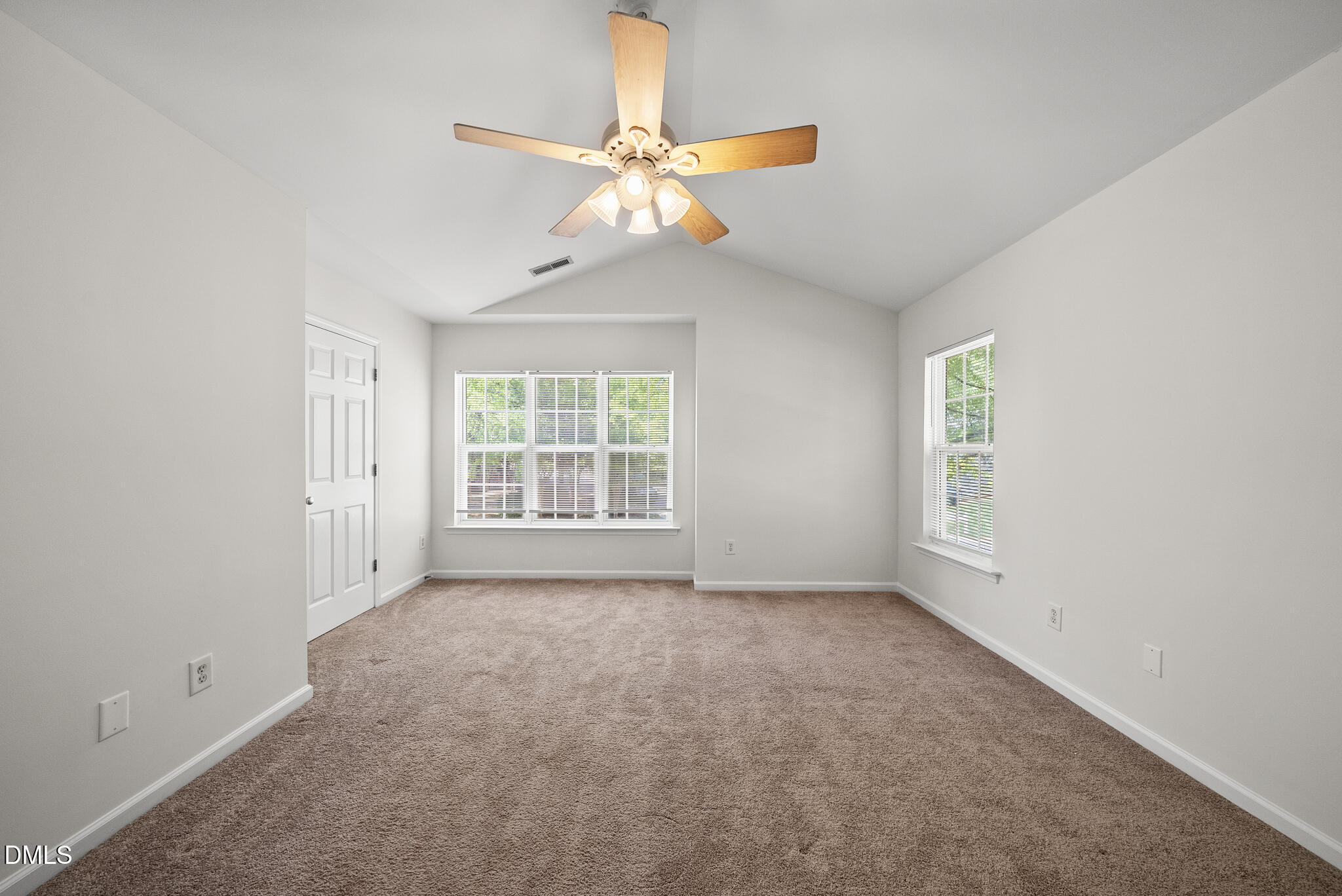 1024 Goldmist Lane Durham, NC 27713 - Photo 18 of 46 an empty room with windows and fan