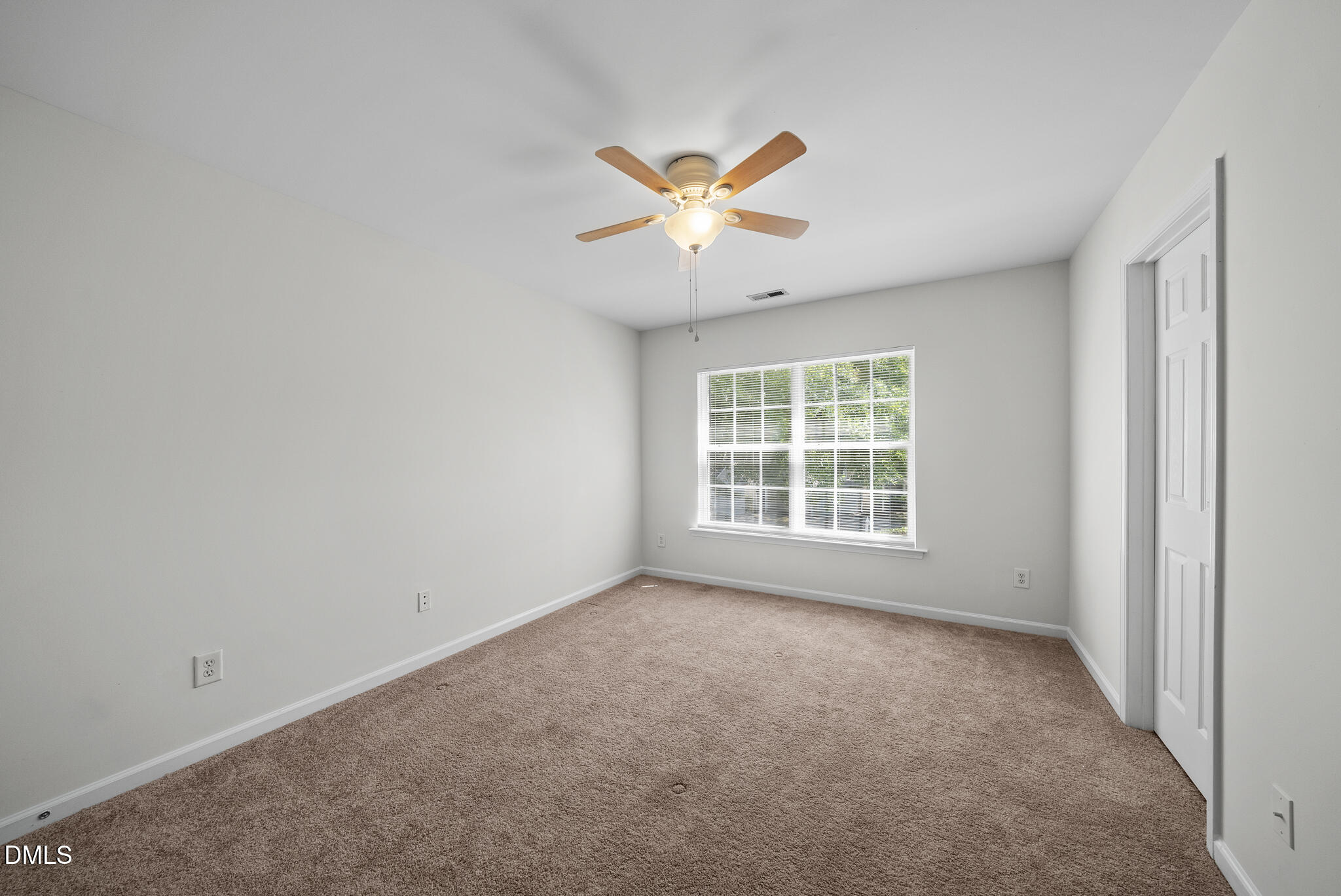 1024 Goldmist Lane Durham, NC 27713 - Photo 29 of 46 a view of an empty room with a window