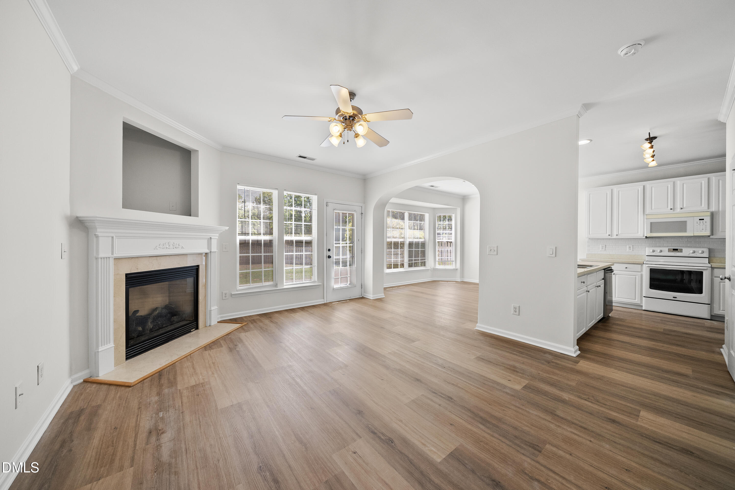 1024 Goldmist Lane Durham, NC 27713 - Photo 3 of 46 a view of a kitchen with wooden floor and a kitchen