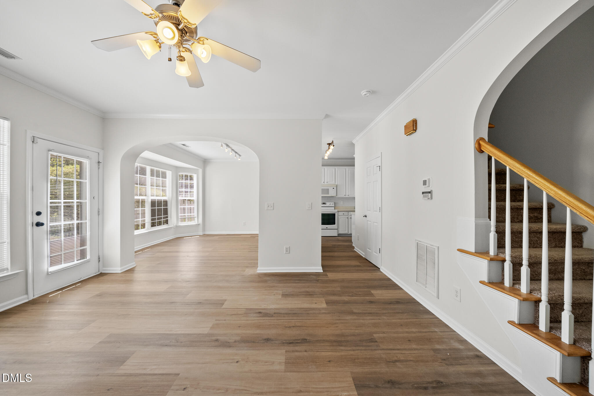 1024 Goldmist Lane Durham, NC 27713 - Photo 4 of 46 wooden floor in an empty room with a window
