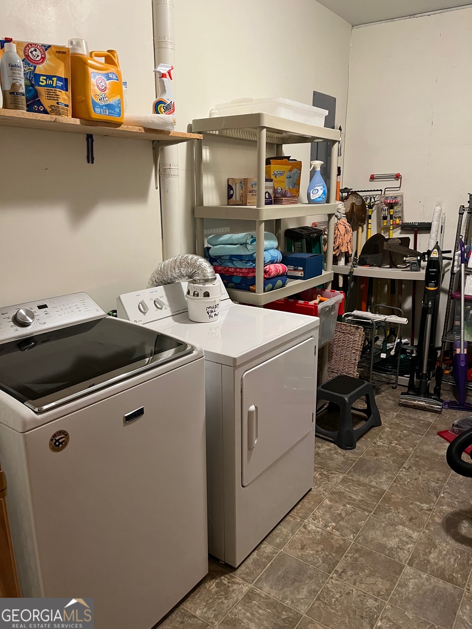 21 Switchback Drive Clayton, GA 30525 - Photo 15 of 15 a utility room with dryer and washer