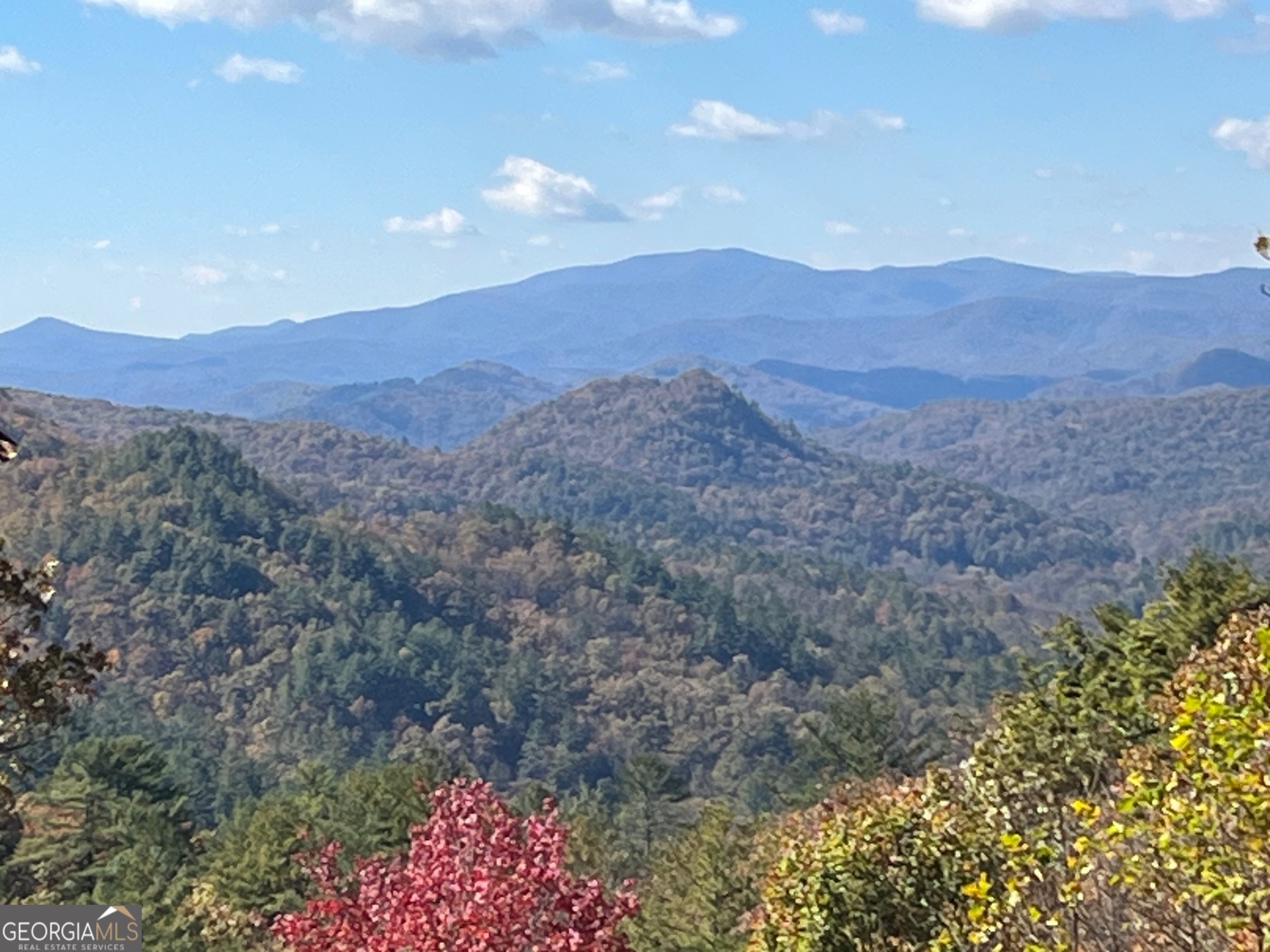 21 Switchback Drive Clayton, GA 30525 - Photo 3 of 15 a view of a lush green hillside and a mountain