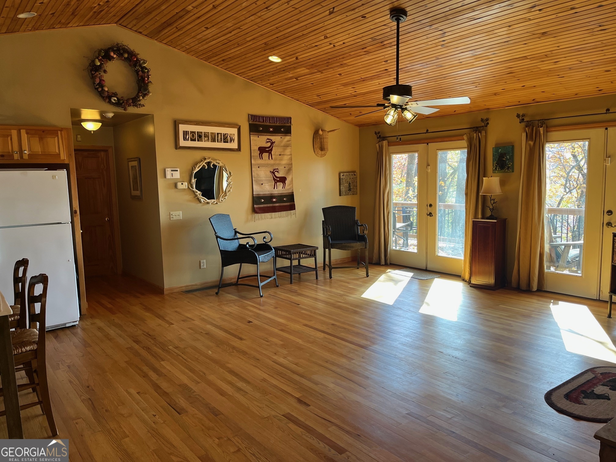 21 Switchback Drive Clayton, GA 30525 - Photo 4 of 15 a view of a livingroom with furniture wooden floor a chandelier