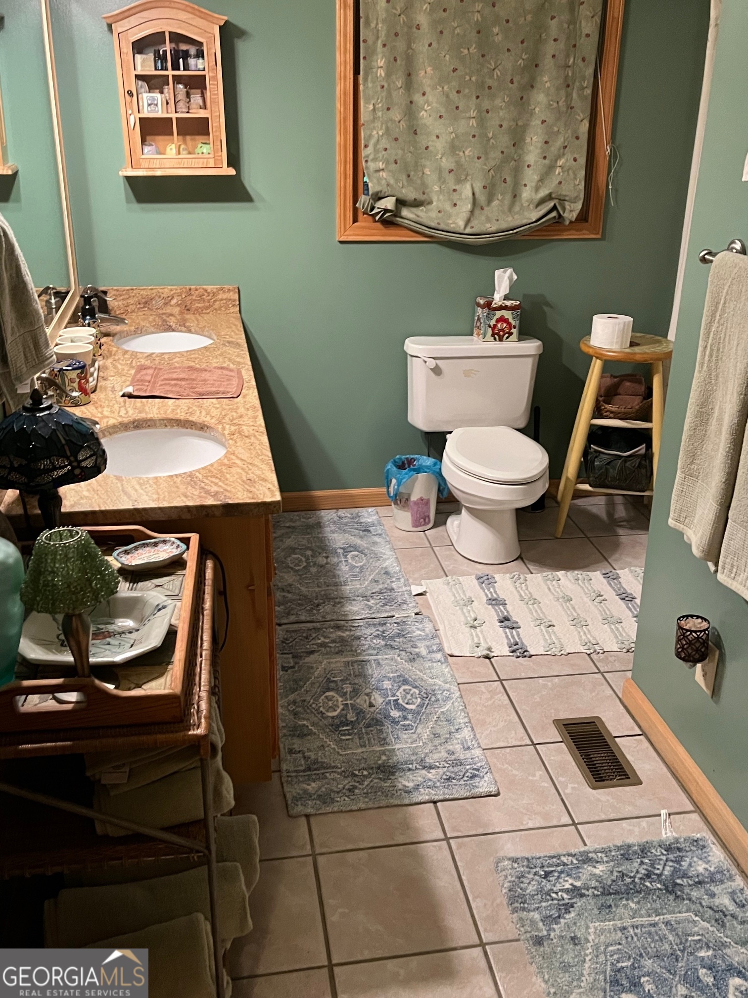 21 Switchback Drive Clayton, GA 30525 - Photo 9 of 15 a bathroom with a toilet and a sink