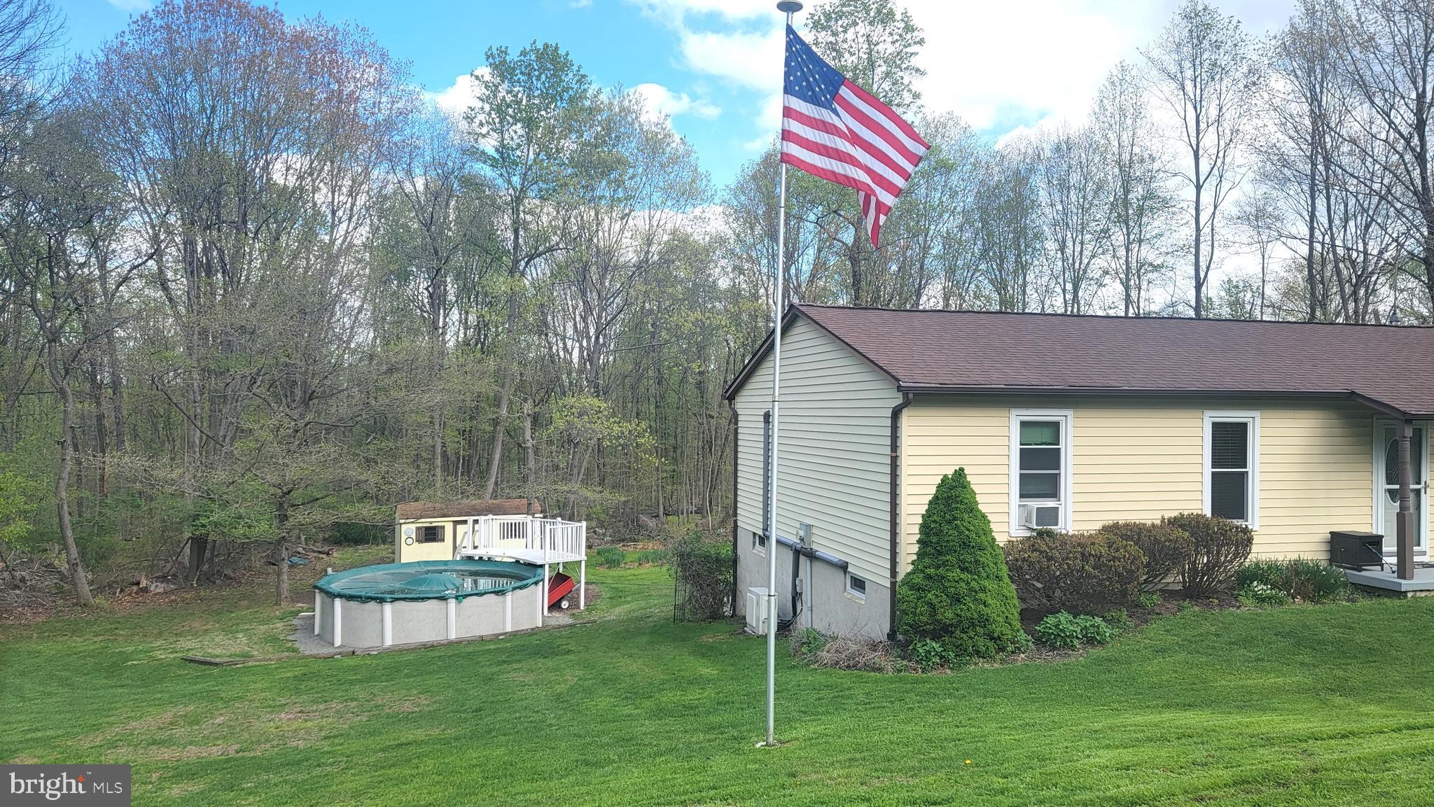 1313 Chestnut Hill Road Morgantown, PA 19543 - Photo 6 of 33 SIDE VIEW TO BACK YARD