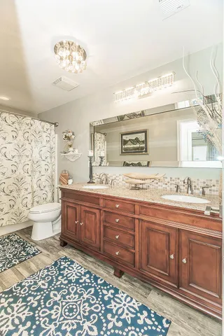 an aerial view of a house with outdoor space and street view