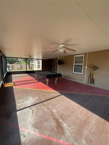 a living room with residential space and wooden floor