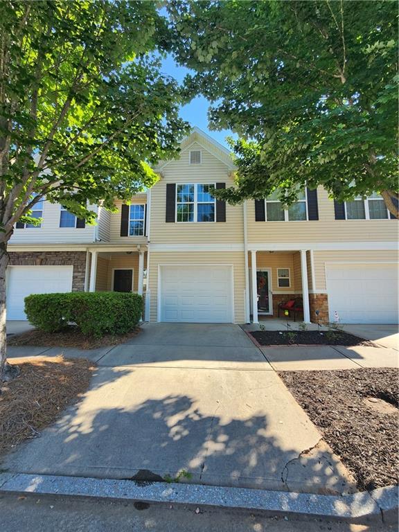 4620 Beacon Ridge Lane Flowery Branch, GA 30542 - Photo 1 of 1 a front view of a house with a yard