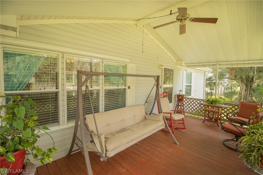 2671 Packinghouse Road Alva, FL 33920 - Photo 11 of 24 a building outdoor space with patio furniture and potted plants