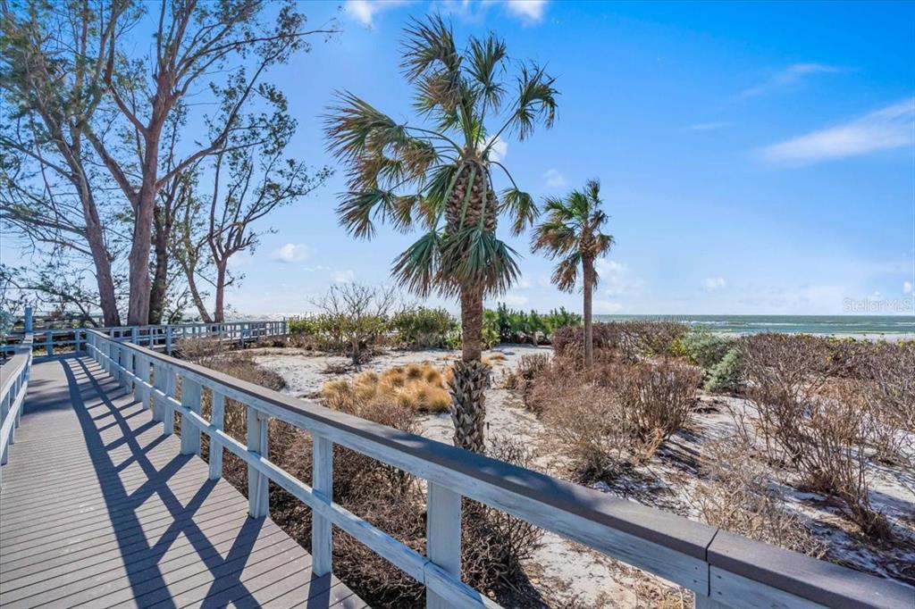 5621 Gulf Of Mexico Drive, Unit 102 Longboat Key, FL 34228 - Photo 21 of 22 a view of a terrace with skyline