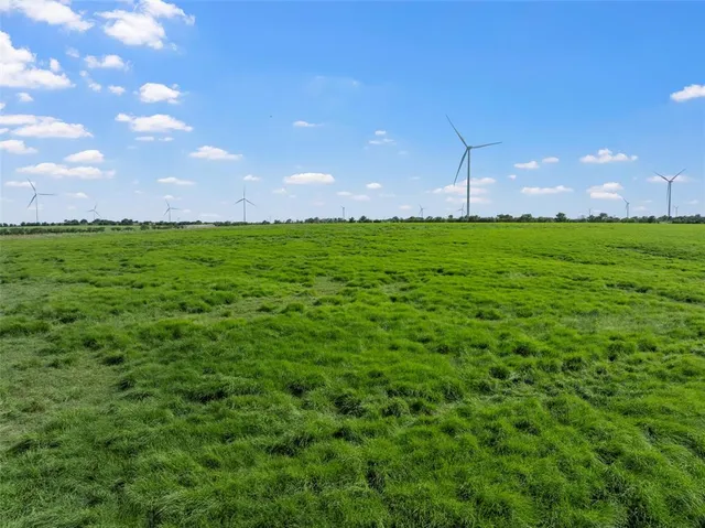 a view of a big room with a lake view