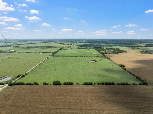 a view of a lake with a beach