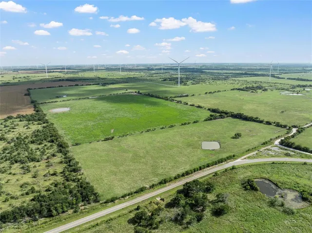 a view of a lake from a yard