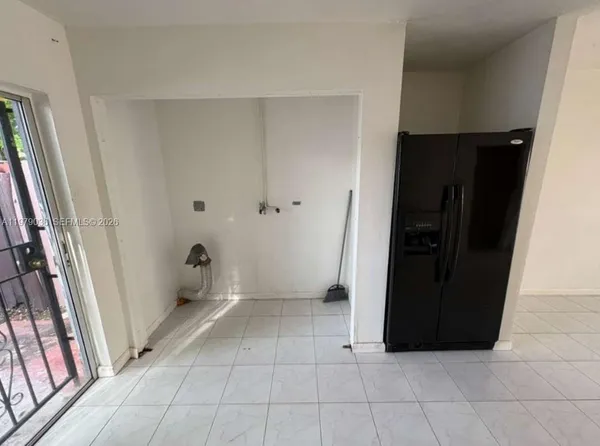 a bathroom with a toilet and a bathtub